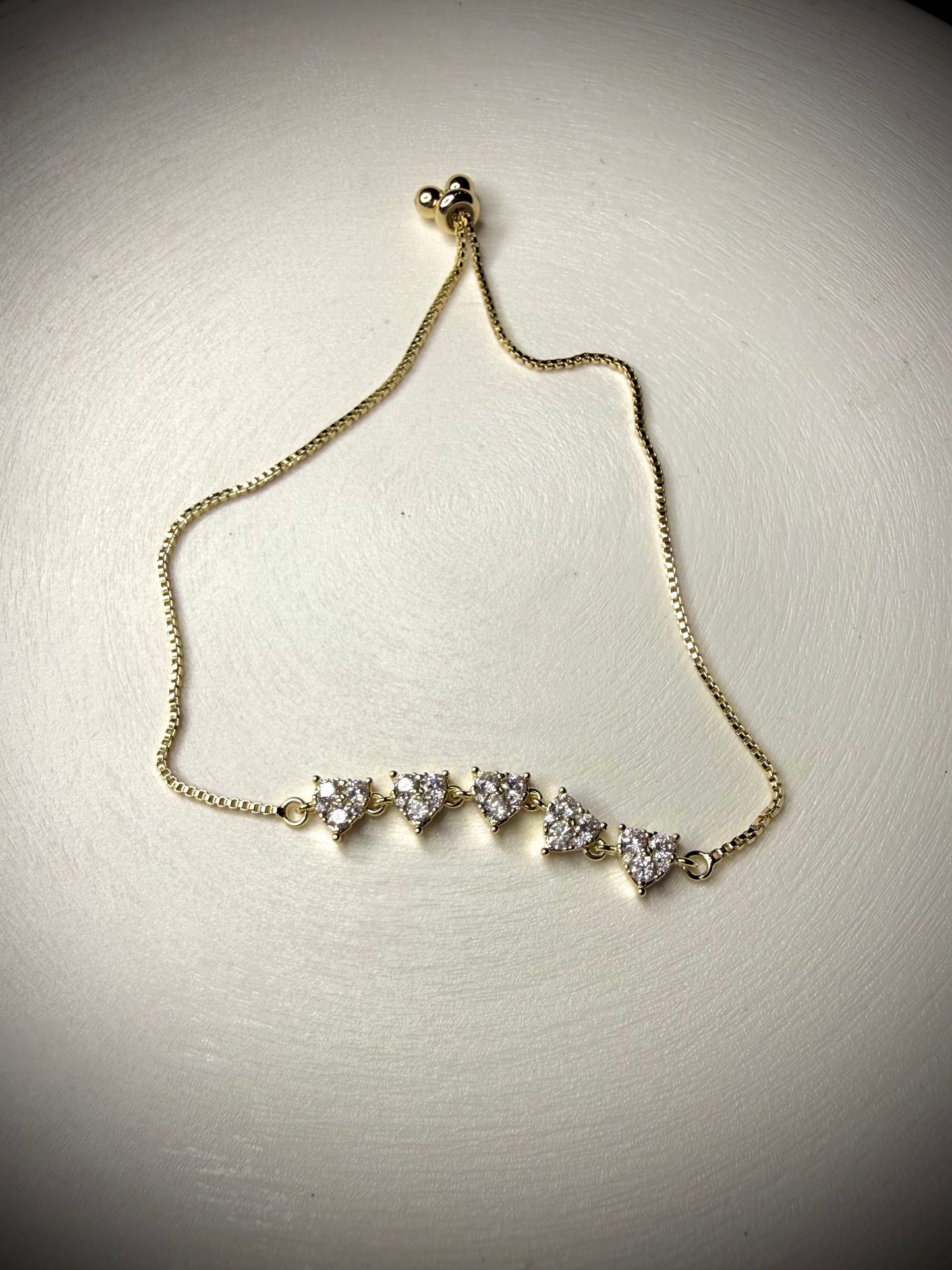 Pulsera Corazones con Circones Baño de Oro 18K (Ajustable)