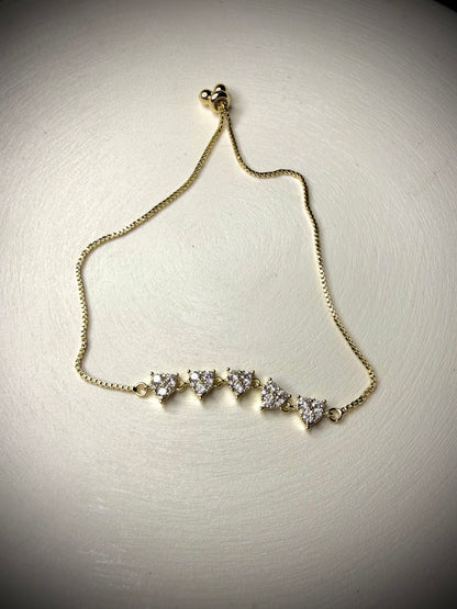 Pulsera Corazones con Circones Baño de Oro 18K (Ajustable)