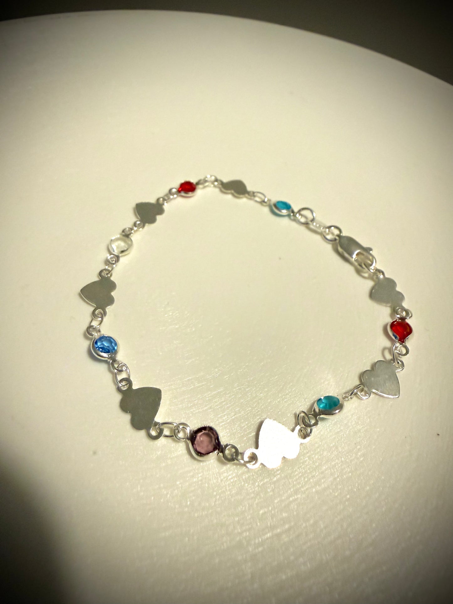 Pulsera Corazones con Punto Plata 925